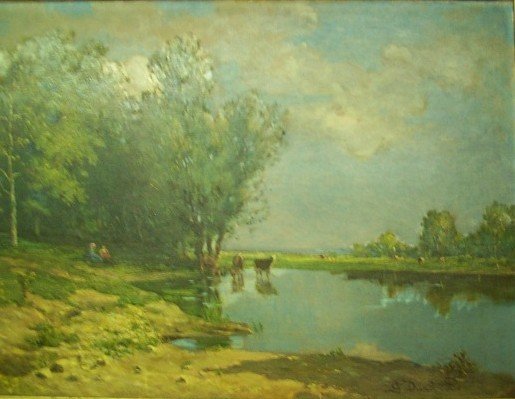 Mucche al pascolo con contadina.