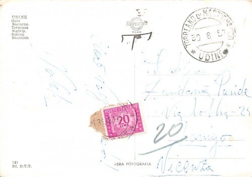 Cartolina Udine Stazione ferroviaria notturno CON SEGNATASSE 20 LIT 1957