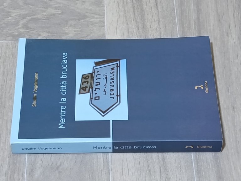 Mentre la città bruciava