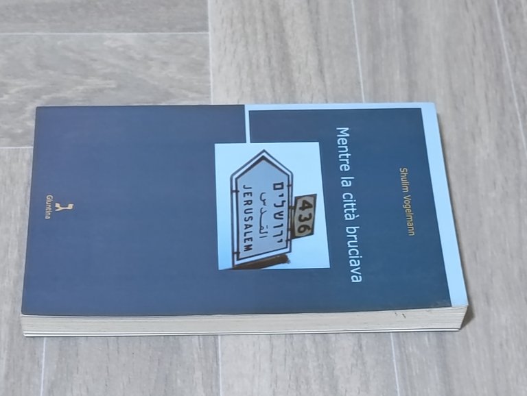 Mentre la città bruciava