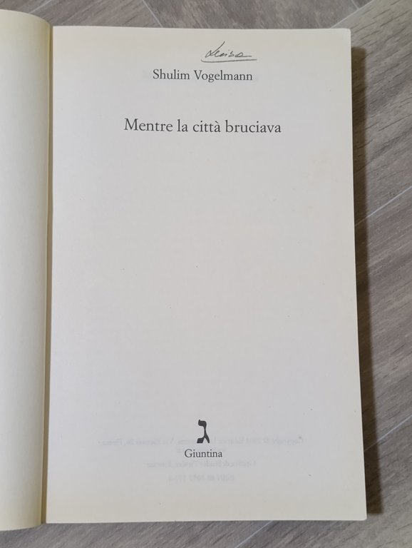 Mentre la città bruciava