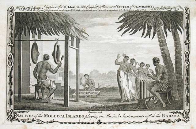 Natives of the Molucca Islands playing on musical instruments called …
