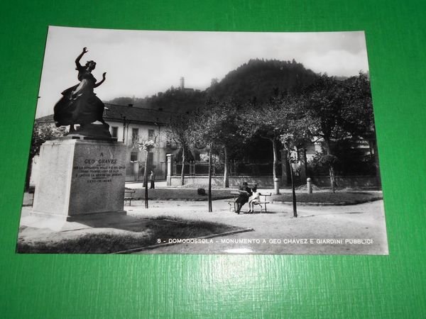 Cartolina Domodossola - Monumento a Geo Chavez e Giardini Pubblici …