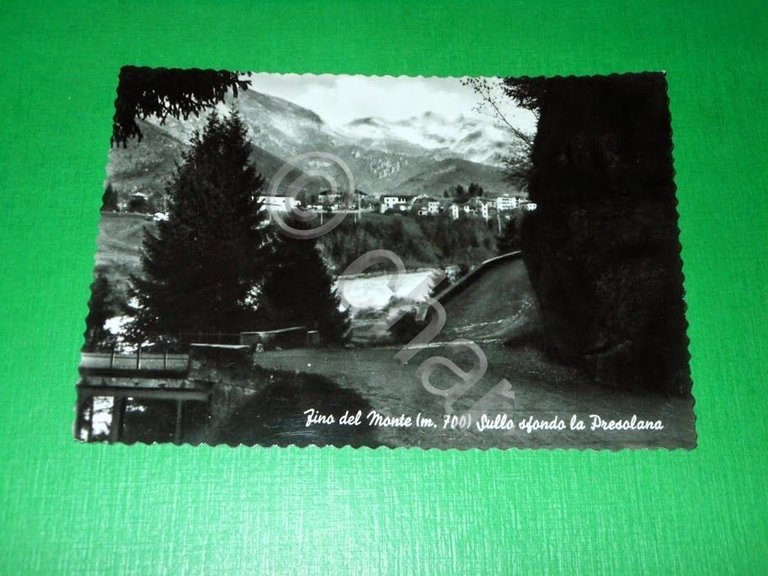 Cartolina Fino del Monte - Scorcio panoramico - Sfondo la …