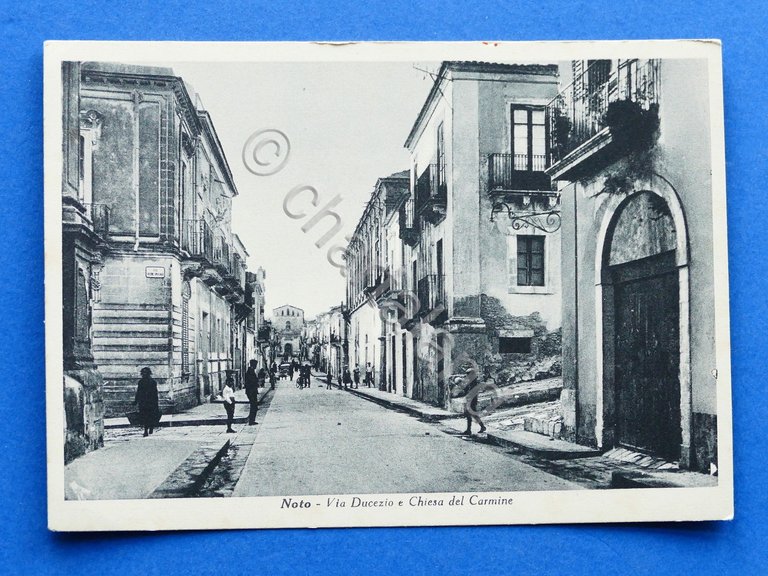 Cartolina Noto - Via Ducezio e Chiesa del Carmine - …