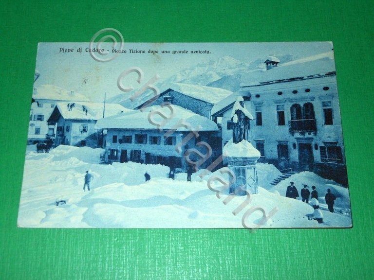 Cartolina Pieve di Cadore - Piazza Tiziano dopo una grande …
