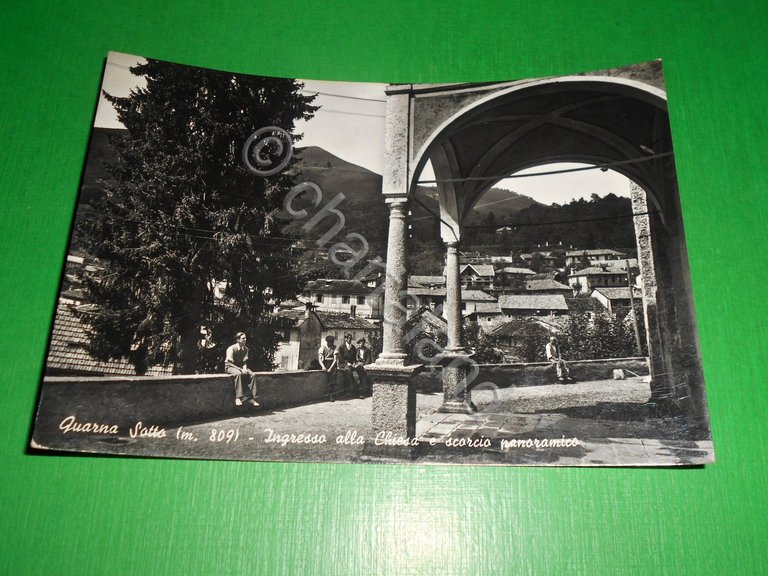 Cartolina Quarna Sotto - Ingresso alla Chiesa e scorcio panoramico …