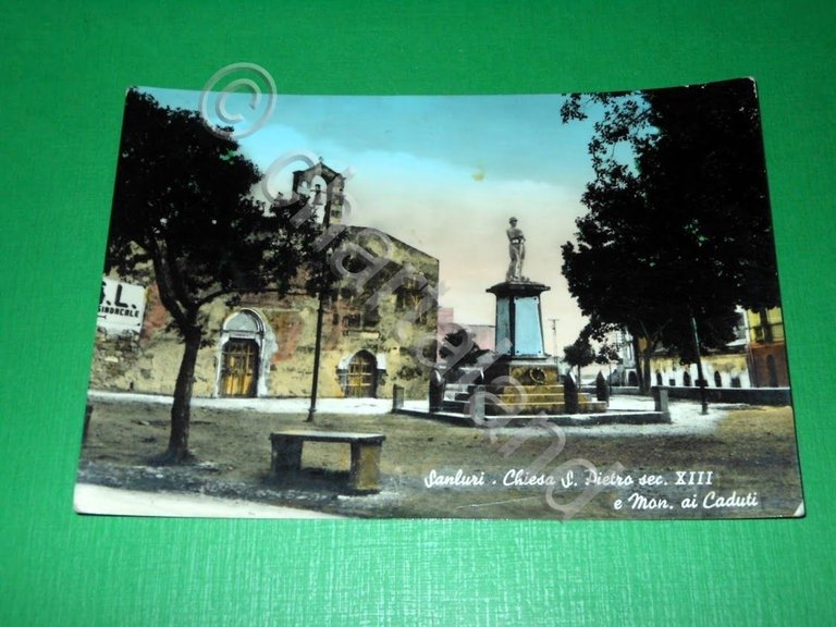 Cartolina Sanluri - Chiesa S. Pietro e Monumento ai Caduti …