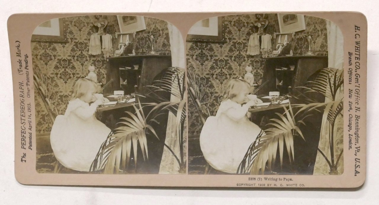 Fotografia stereoscopica - Bambina scrive lettera al papà - 1902