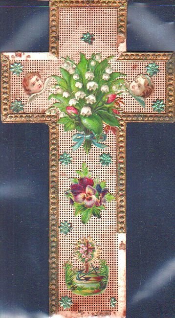 Croce con applicati fiori e testine di Cherubini in cromolitografia; …