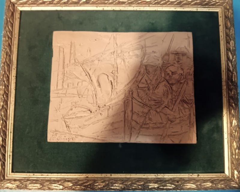 Scena di pescatori, barche e porto.