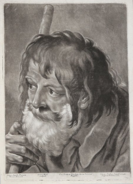 Profilo di uomo con barba e bastone