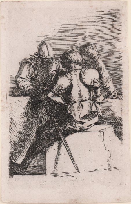 Soldati che giocano accanto ad un muro