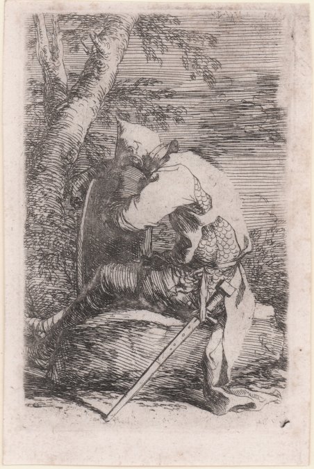 Soldato seduto appoggiato alla scudo