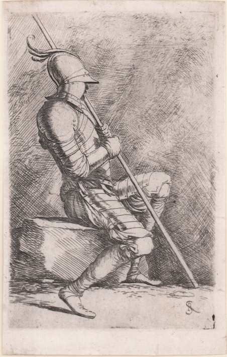 Soldato seduto su una pietra