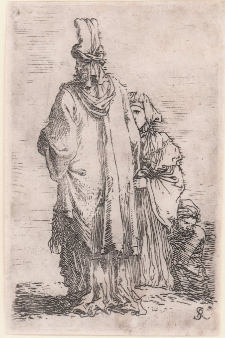 Vecchio orientale di spalle e due donne