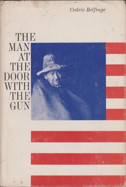 THE MAN AT THE DOOR WITH THE GUN