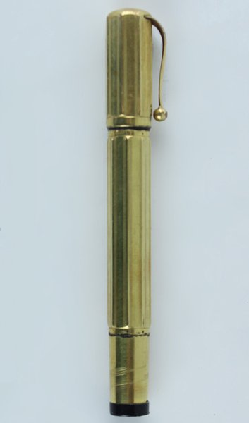 PENNA STILOGRAFICA PENNINO RIENTRANTE laminata, fusto prismatico, 1920 ca. Fuzionante.