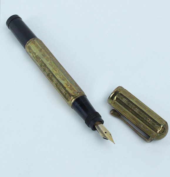 PENNA STILOGRAFICA LAMINATA PENNINO RIENTRANTE, 1920 ca. Pennino oro. Funzionante