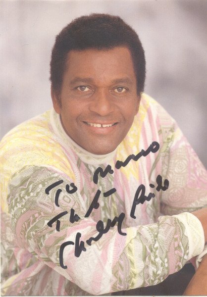 Fotografia con firma autografa del cantante folk statunitense Charley Pride.